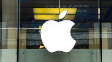 The Apple logo on a glass storefront in Ireland