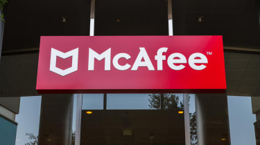 The McAfee company logo hung above the entrance to company offices