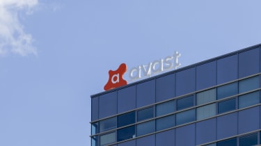 The Avast logo on top of an office building in broad daylight