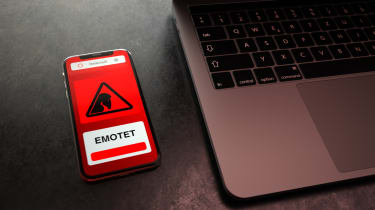 3D illustration of the emotet botnet triggering an alert on a smartphone positioned next to a laptop