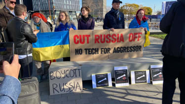 Ukrainian protesters slogans, including &quot;no tech for aggressor&quot;, MWC22