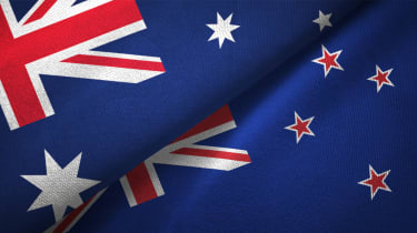Close up of the Australian and New Zealand flags stacked on top of each other