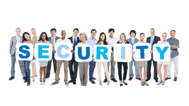 People holding Security sign