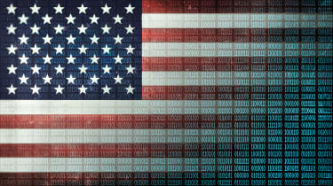 A digital version of the US flag, the right side of which has been transformed to binary code