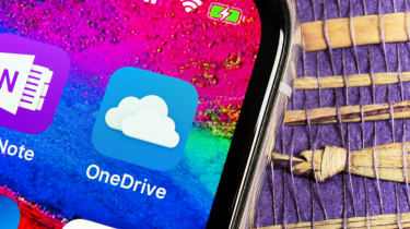 A close up photo of a smartphone screen with a shortcut for the OneDrive app displayed
