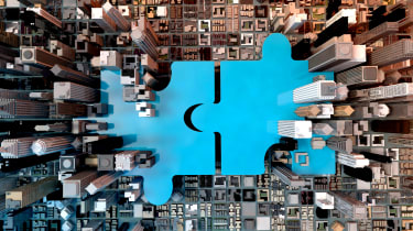 Two interconnected puzzle pieces overlaid on a top-down cityscape